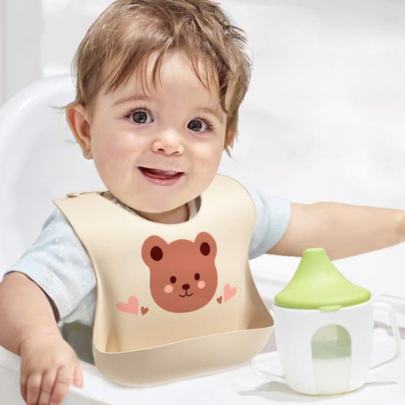 防水ベビービブソフトシリコンスカーフかわいい漫画クマプリント - Baby Food Apron のレビューと価格