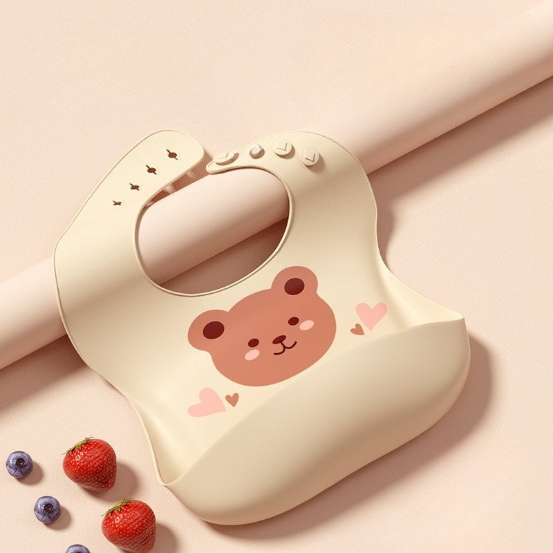 防水ベビービブソフトシリコンスカーフかわいい漫画クマプリント - Baby Food Apron のレビューと価格