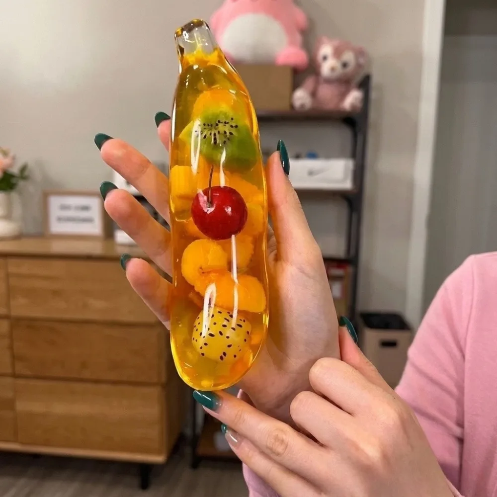 柔らかいバナナ型のモールト入り、ゆっくりと膨らむ、指先で遊べ - Baby Food Banana のレビューと価格